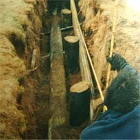 Deadman anchoring system for securing stantions and bulk heading.